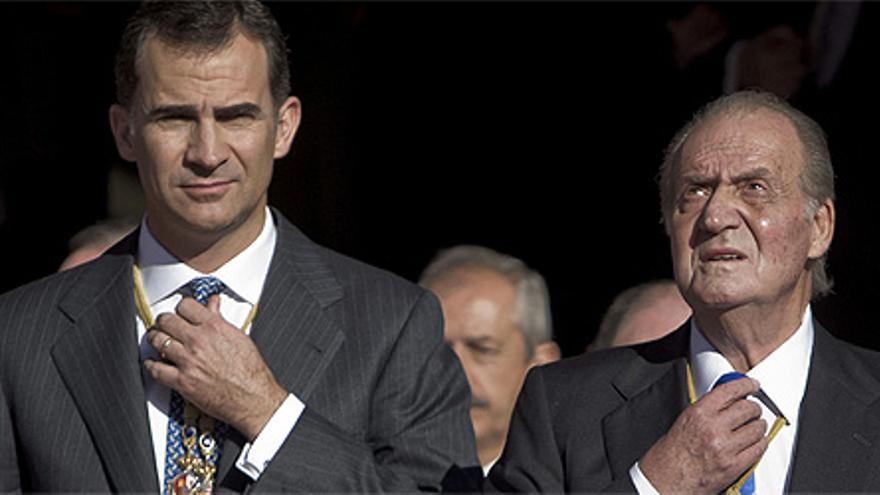 Juan Carlos y su hijo Felipe 