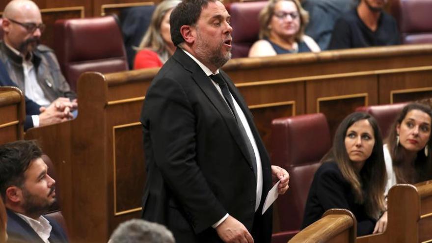 Junqueras promete su cargo de diputado "como preso político"